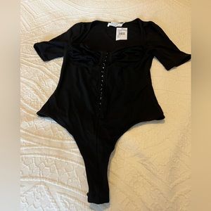 NWT ASTR Women’s Black Body Suit size Medium
